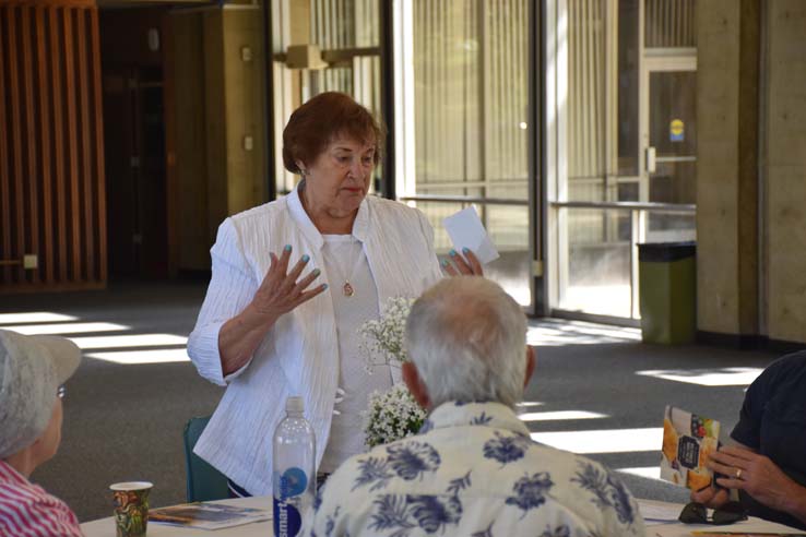 People enjoying the retiree brunch and campus tour