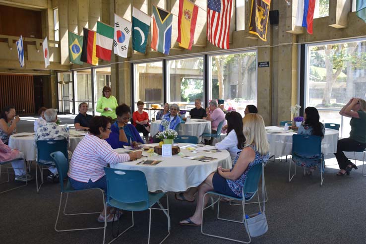 People enjoying the retiree brunch and campus tour