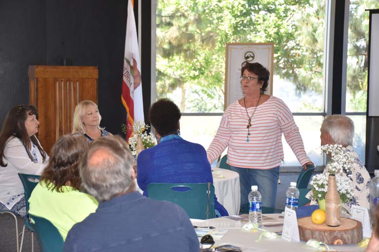 People enjoying the retiree brunch and campus tour