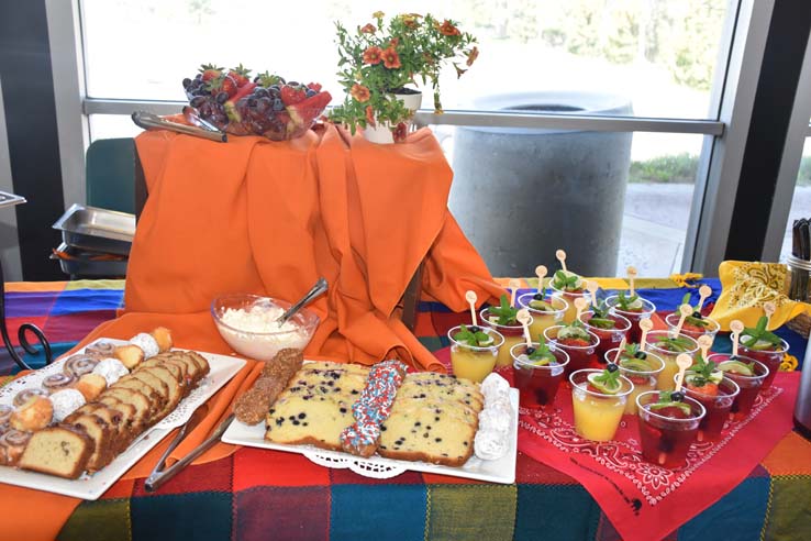 People enjoying the retiree brunch and campus tour