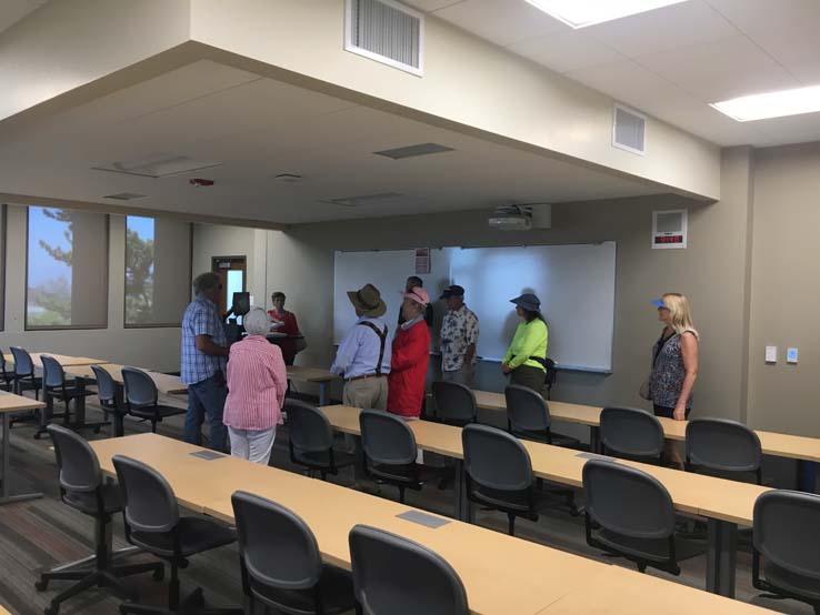 People enjoying the retiree brunch and campus tour