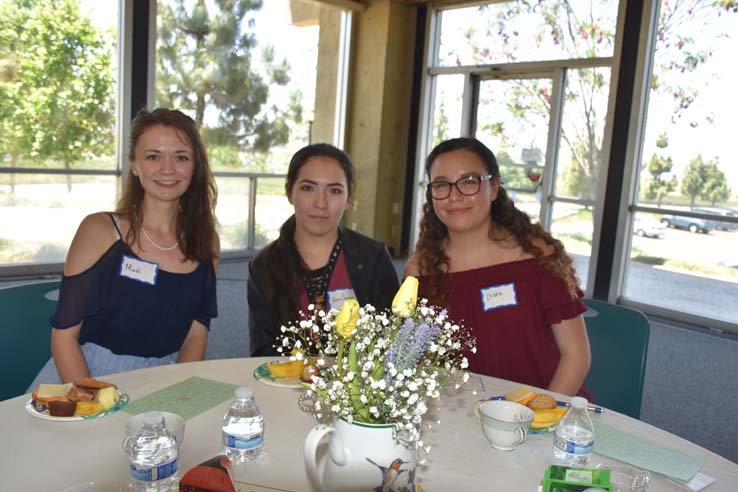 Students and faculty attend the spring Tea with the Deans event.