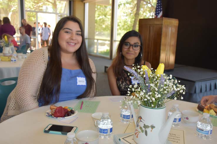 Students and faculty attend the spring Tea with the Deans event.