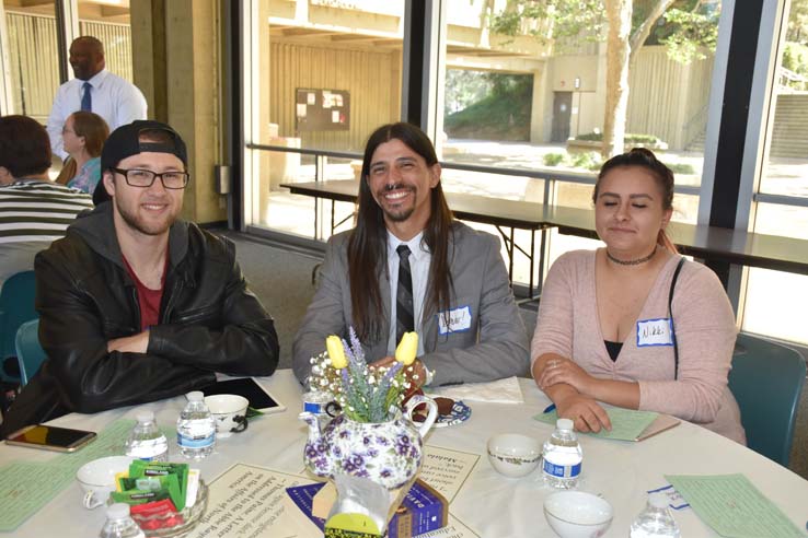 Students and faculty attend the spring Tea with the Deans event.