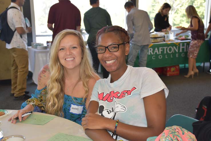 Students and faculty attend the spring Tea with the Deans event.