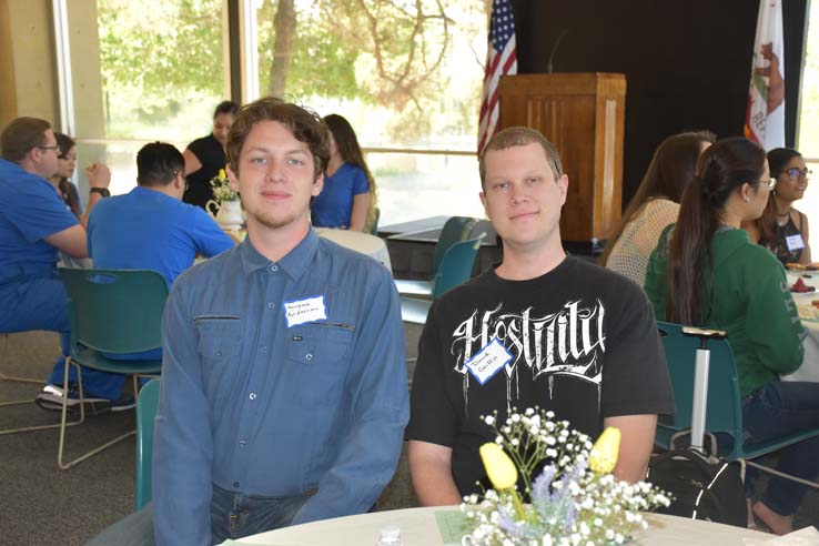 Students and faculty attend the spring Tea with the Deans event.