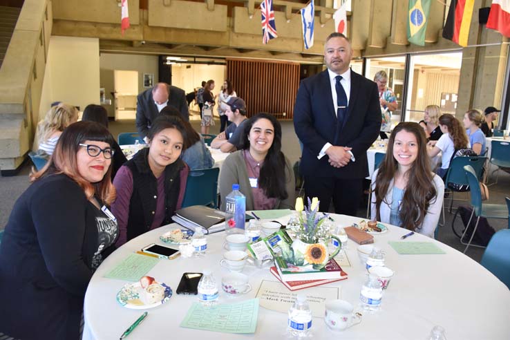 Students and faculty attend the spring Tea with the Deans event.