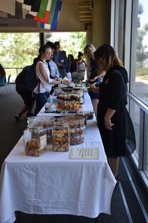 Students and faculty attend the spring Tea with the Deans event.