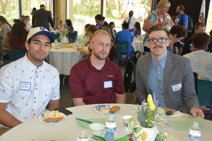 Students and faculty attend the spring Tea with the Deans event.