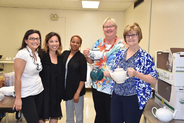 Students and faculty attend the spring Tea with the Deans event.