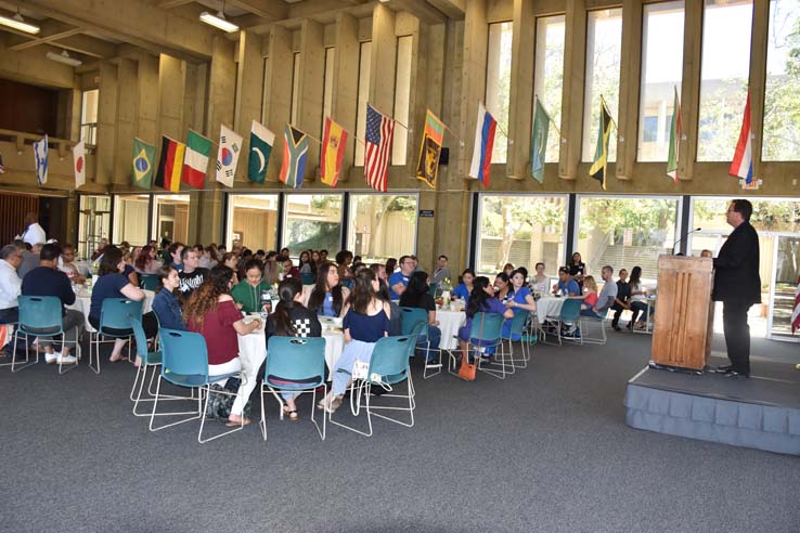 Students and faculty attend the spring Tea with the Deans event.