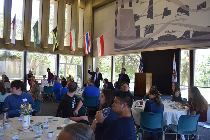 Students and faculty attend the spring Tea with the Deans event.