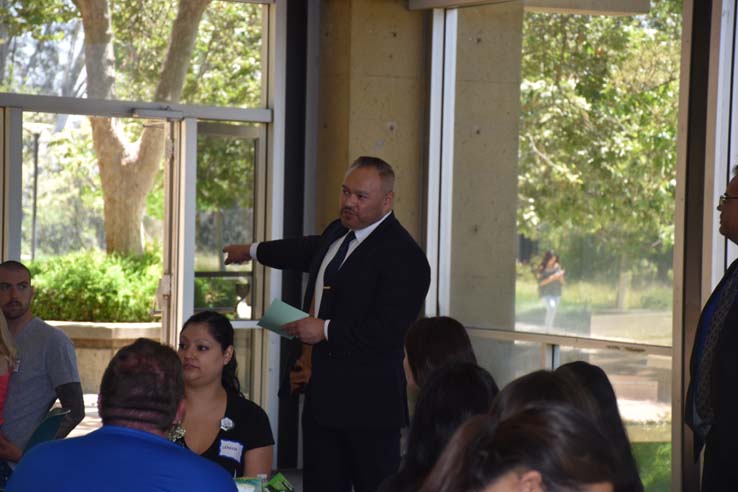 Students and faculty attend the spring Tea with the Deans event.