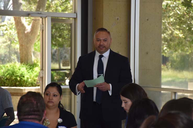 Students and faculty attend the spring Tea with the Deans event.