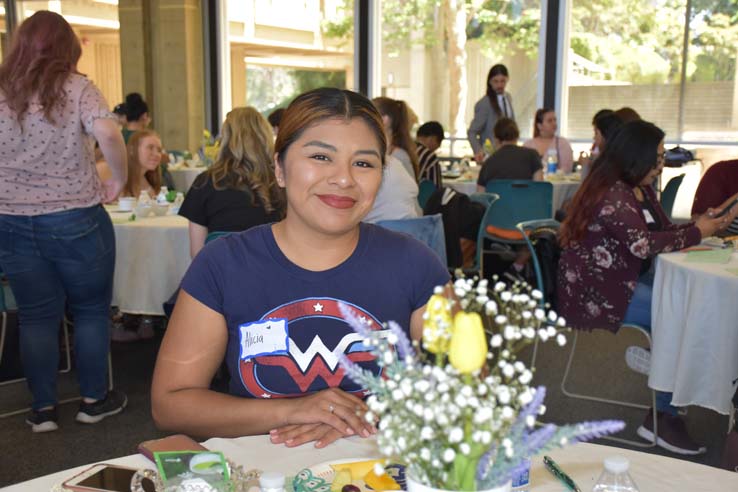 Students and faculty attend the spring Tea with the Deans event.