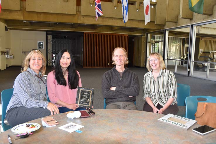 Faculty and staff celebrate the Employee Appreciation & Recognition Reception.