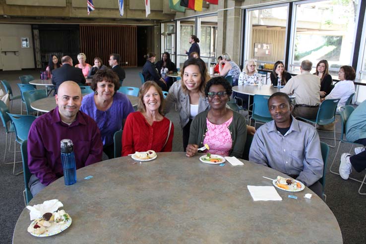 Faculty and staff celebrate the Employee Appreciation & Recognition Reception.