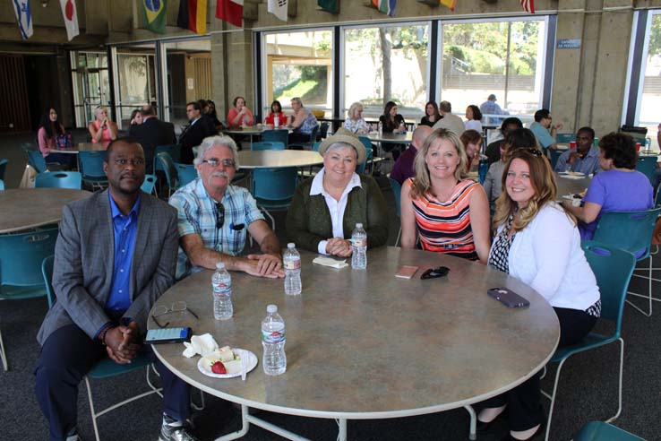 Faculty and staff celebrate the Employee Appreciation & Recognition Reception.