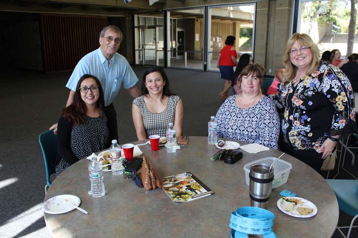 Faculty and staff celebrate the Employee Appreciation & Recognition Reception.