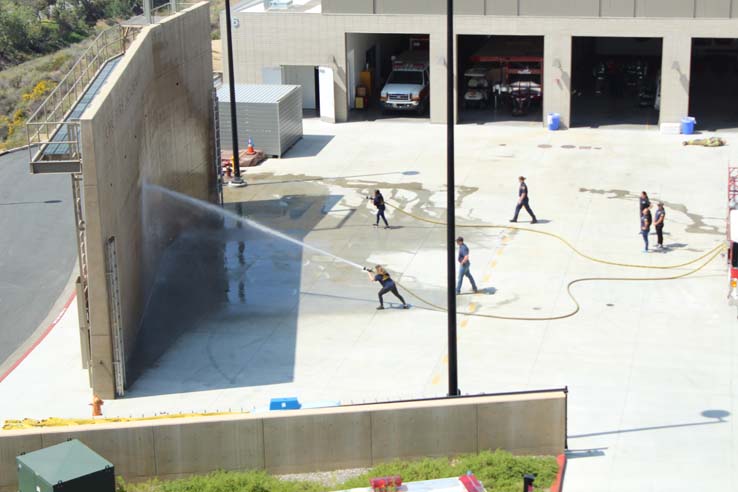 Participants in the open house undergoing a circuit.