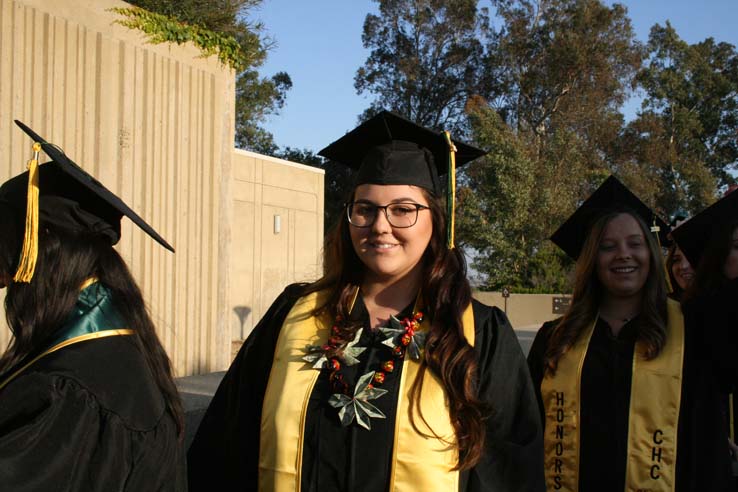 Students on walkway at Commencement