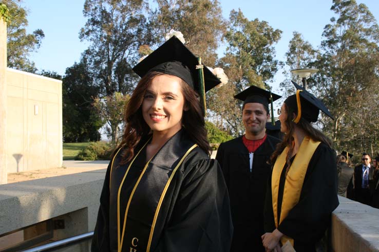 Students on walkway at Commencement