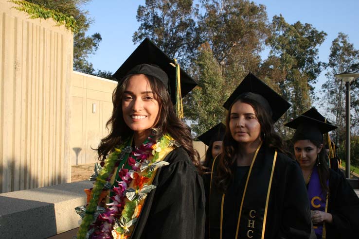 Students on walkway at Commencement