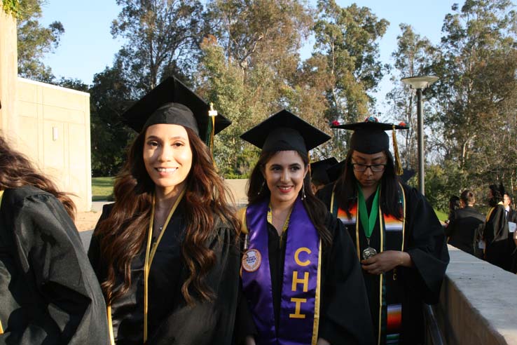 Students on walkway at Commencement