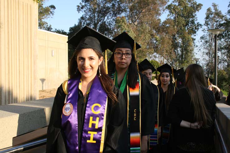 Students on walkway at Commencement