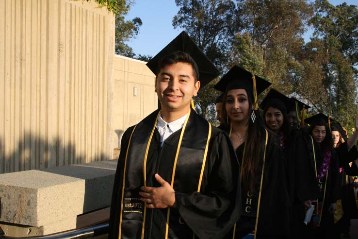 Students on walkway at Commencement