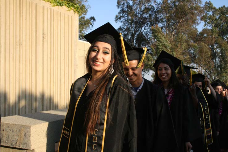 Students on walkway at Commencement