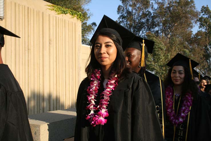 Students on walkway at Commencement