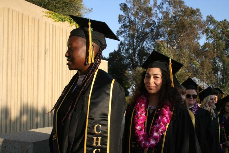 Students on walkway at Commencement