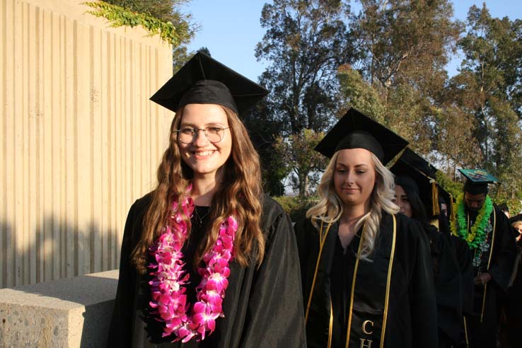 Students on walkway at Commencement