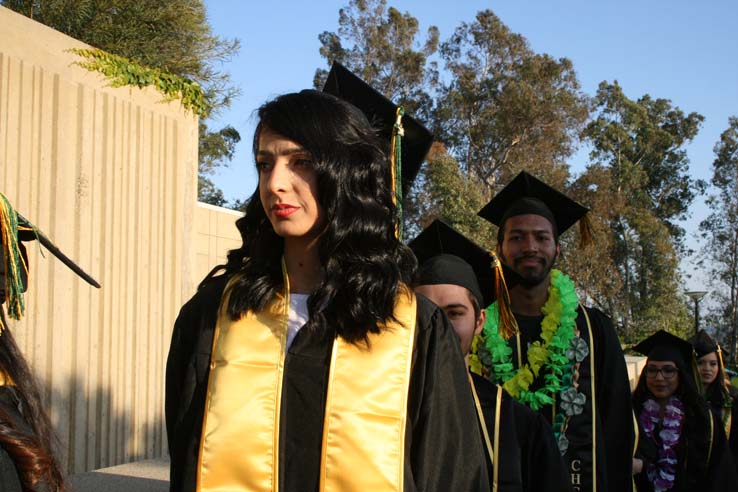 Students on walkway at Commencement