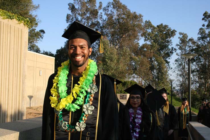 Students on walkway at Commencement