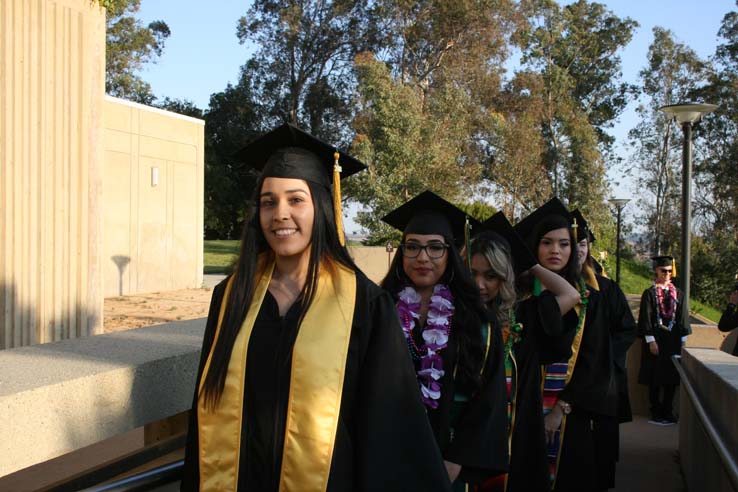 Students on walkway at Commencement