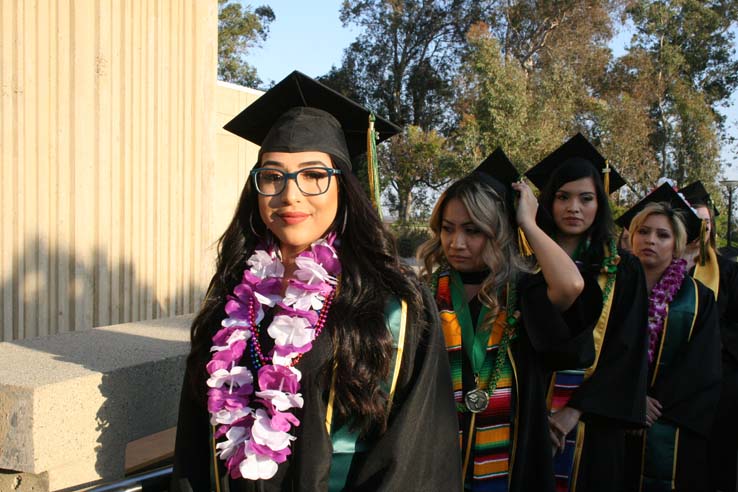 Students on walkway at Commencement