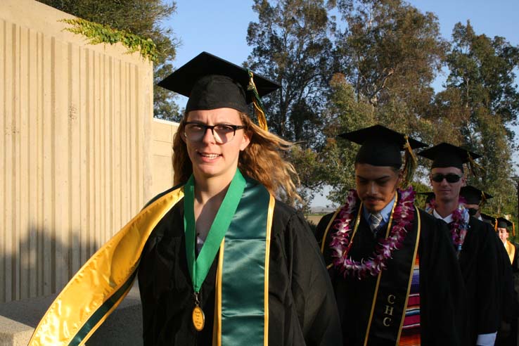 Students on walkway at Commencement