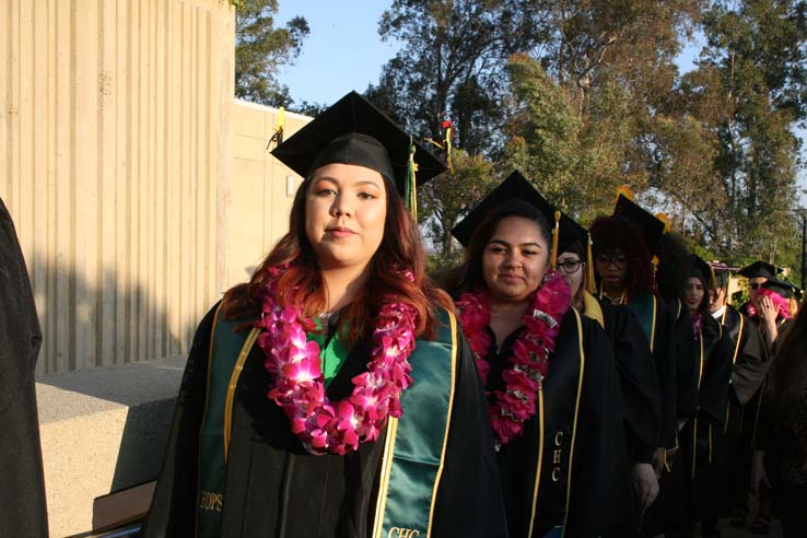 Students on walkway at Commencement