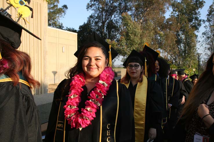 Students on walkway at Commencement