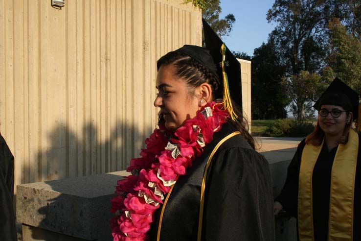 Students on walkway at Commencement