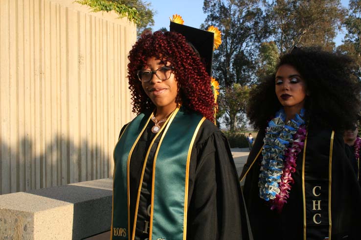 Students on walkway at Commencement