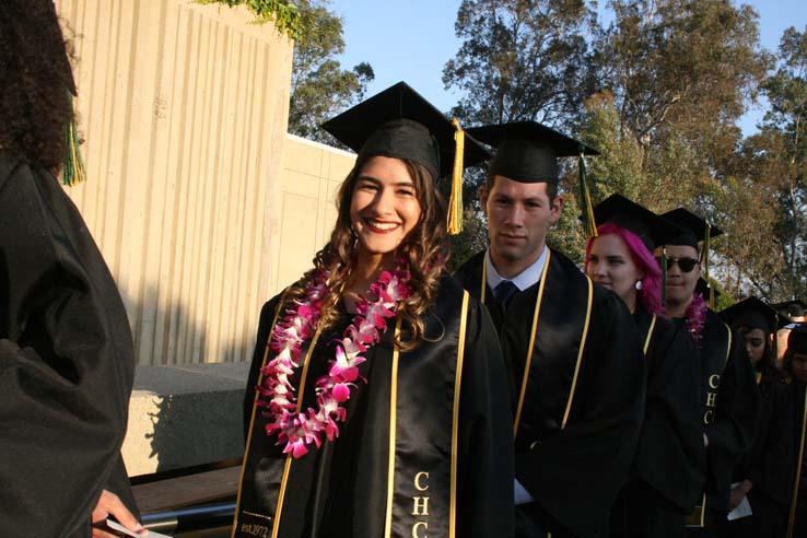 Students on walkway at Commencement