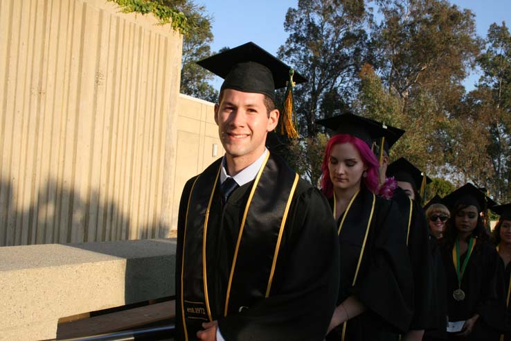 Students on walkway at Commencement