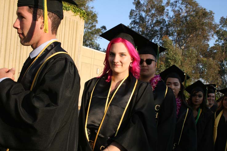 Students on walkway at Commencement