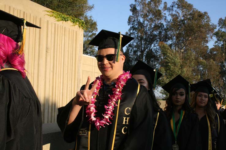 Students on walkway at Commencement