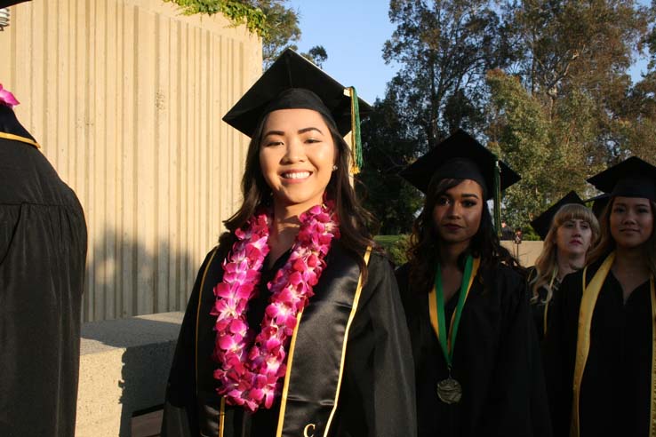 Students on walkway at Commencement