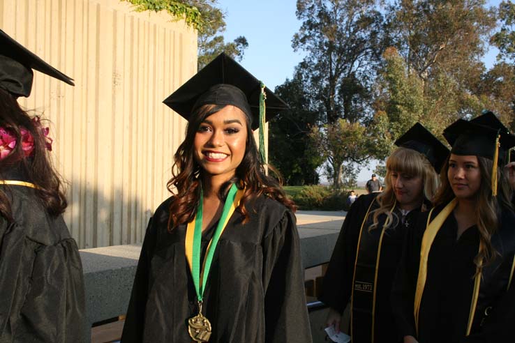 Students on walkway at Commencement