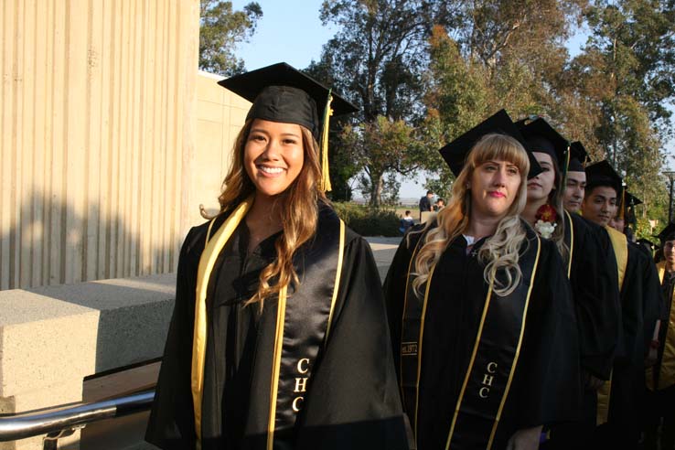 Students on walkway at Commencement